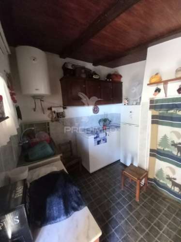 Casa de aldeia com quintal