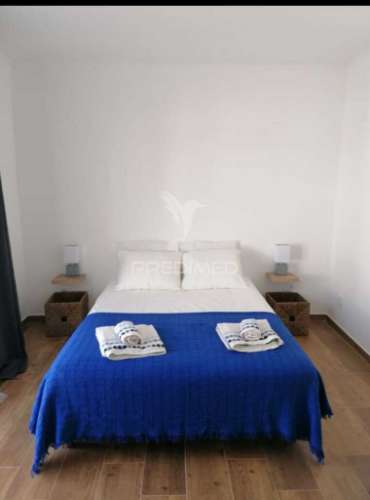 Moradia bi-familiar t6 com espaço exterior - v.n. milfontes