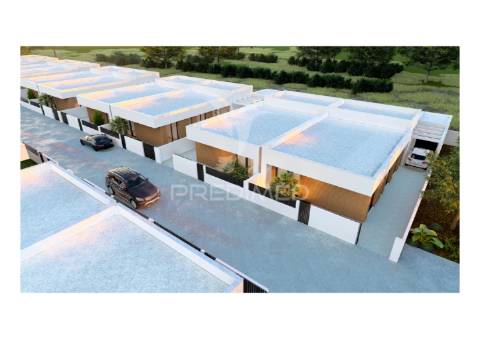 Moradia t4 térrea, com 3 suites e piscina no condomínio tower village