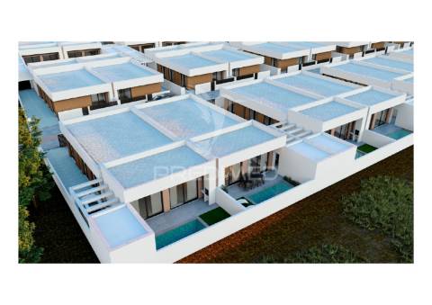 Moradia t4 térrea, com 2 suites e piscina no condomínio tower village