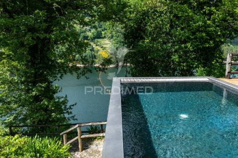 Refúgio de luxo no gerês – moradia térrea t4 com piscina e vista rio  barragem de salamonde | 4 suites | piscina | churrasqueira | vistas deslumbrantes