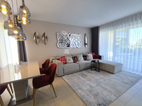 T2 condominio fechado com jardim, sauna e piscinas