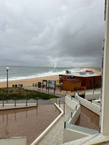 T2 mobiliado com 2 garagens - pé na areia da praia consolação