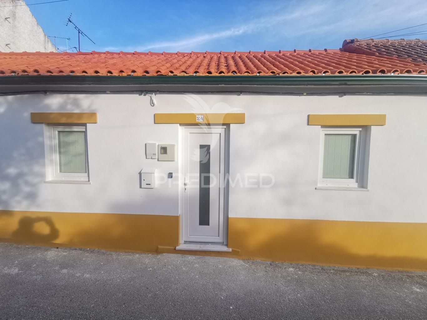 Casa térrea de aldeia