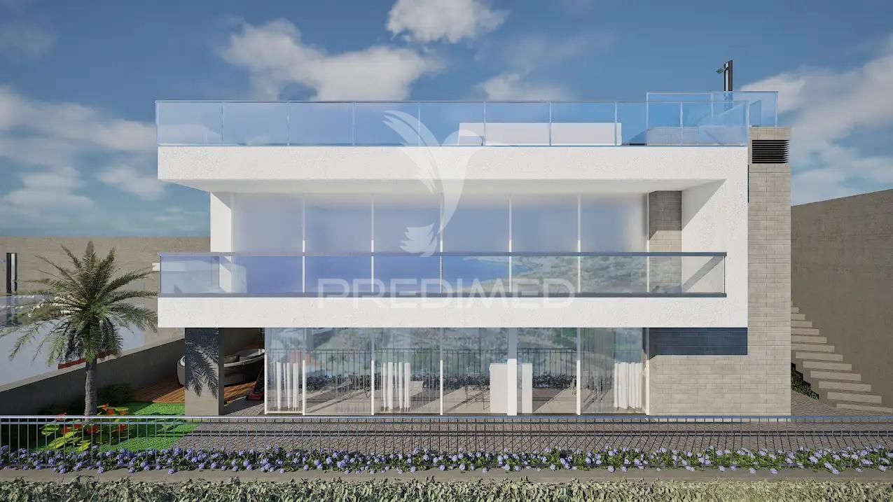 Moradia t3 em fase de construção com vista mar , santa cruz - ilha da madeira