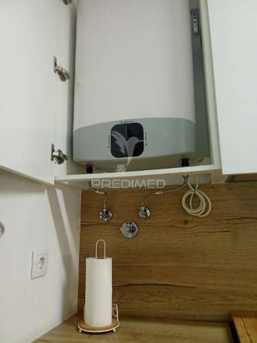 T2 remodelado com cozinha equipada