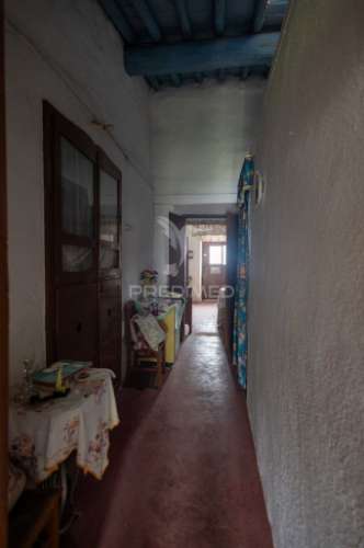 Moradia típica alentejana t2 + t2 com pomar no centro do alandroal com 2.659 m2