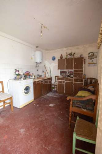 Moradia típica alentejana t2 + t2 com pomar no centro do alandroal com 2.659 m2