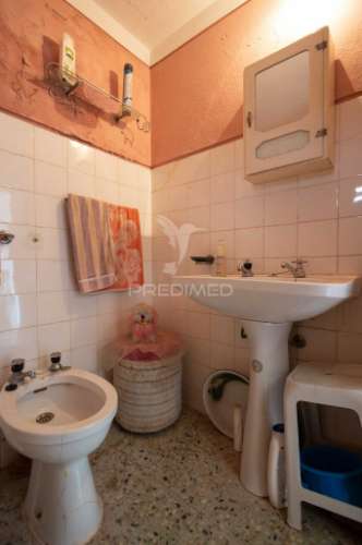 Moradia típica alentejana t2 + t2 com pomar no centro do alandroal com 2.659 m2