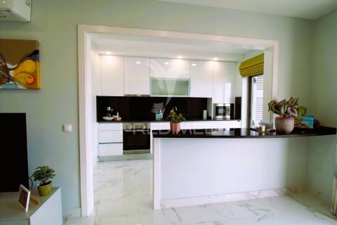 Viva o sonho na praia da rocha: t1 com piscina e garagem