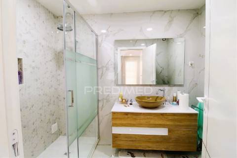 Viva o sonho na praia da rocha: t1 com piscina e garagem