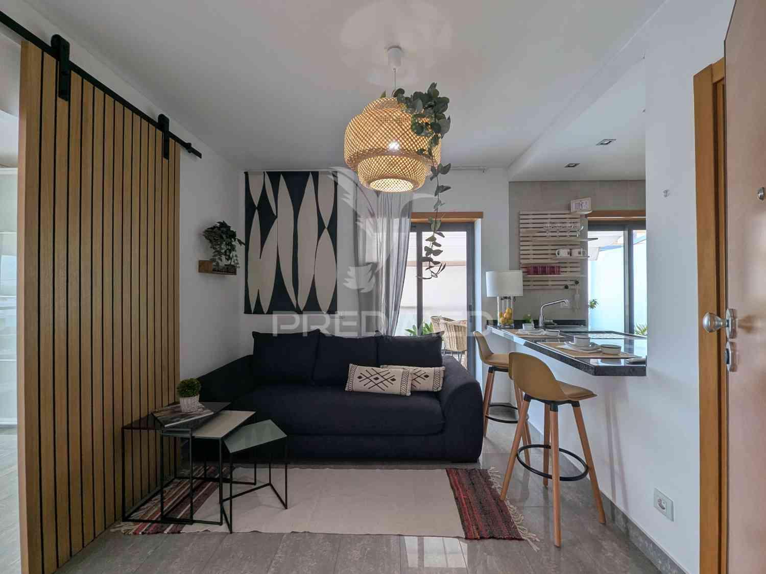 Magnífico t1, central, com um terraço, vista rio e garagem