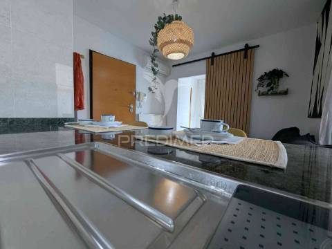 Magnífico t1, central, com um terraço, vista rio e garagem