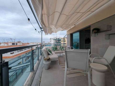 Magnífico t1, central, com um terraço, vista rio e garagem