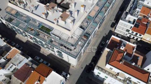 Magnífico t1, central, com um terraço, vista rio e garagem