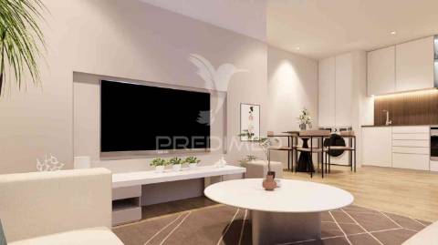 T1 num r/c de um edifício em construção, central - fracção b