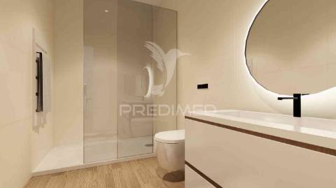 T1 num r/c de um edifício em construção, central - fracção b