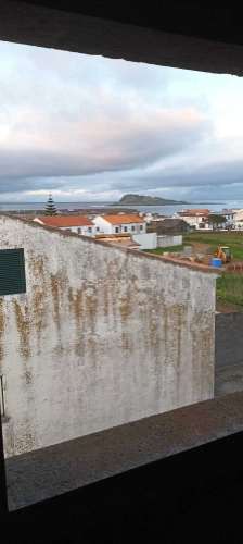 Lote com moradia em construção