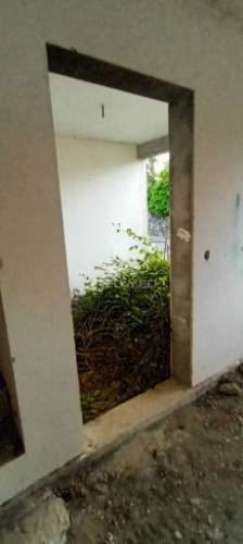 Lote com moradia em construção