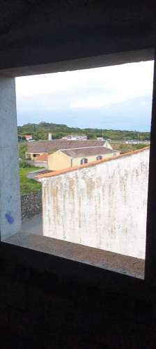 Lote com moradia em construção