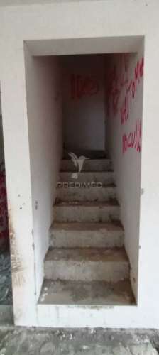 Lote com moradia em construção