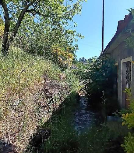 Moradia com terreno e projeto aprovado