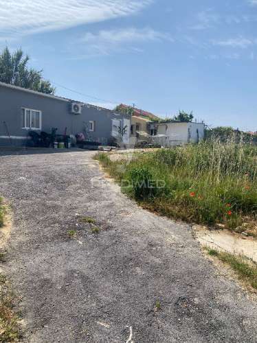 Terreno em almada com 4 casas , otimo para investimentos --sobreda