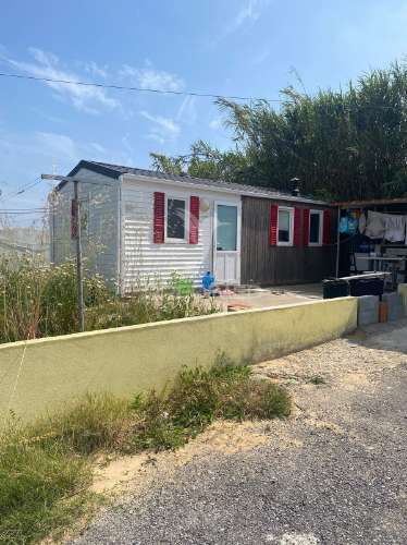 Terreno em almada com 4 casas , otimo para investimentos --sobreda