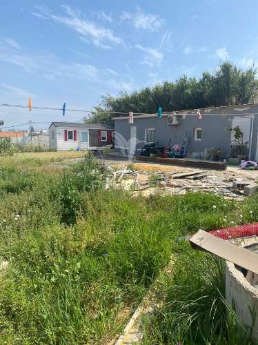 Terreno em almada com 4 casas , otimo para investimentos --sobreda