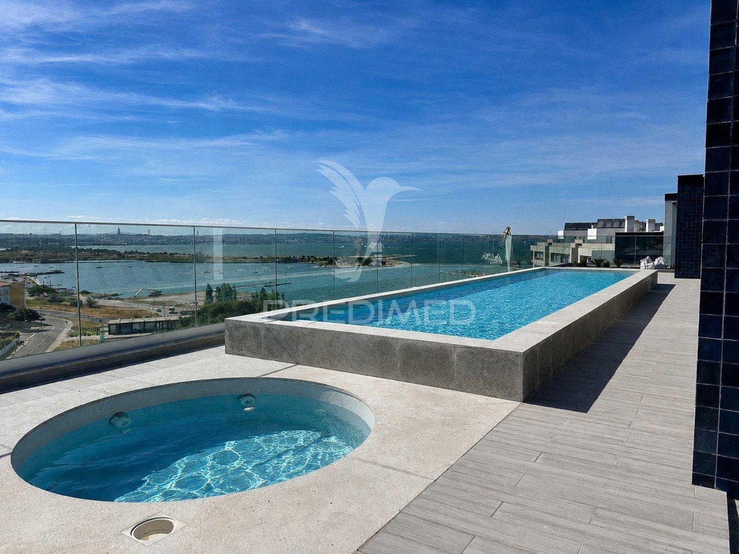 T1 premium com vista rio e rooftop com piscinas | edifico orizon | quinta da trindade – seixal