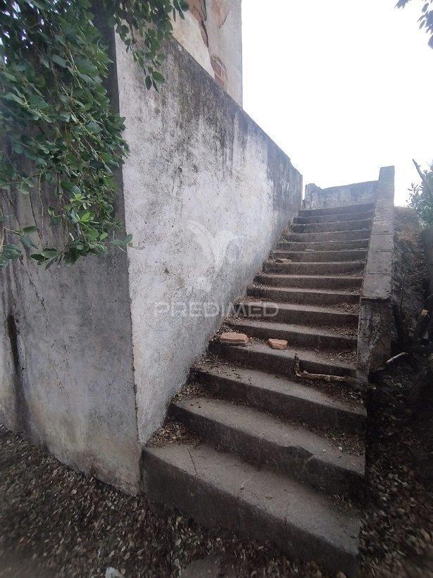 Terreno com casa antigo