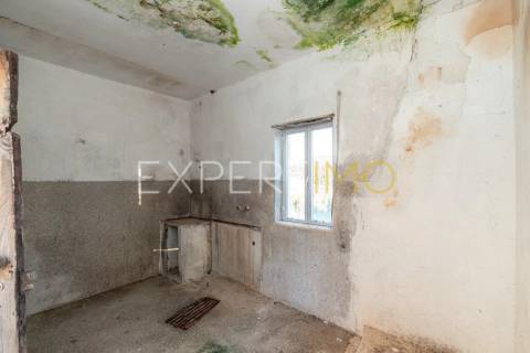 Moradia isolada com terreno e poço em Anaguéis (Almalaguês, Coimbra)