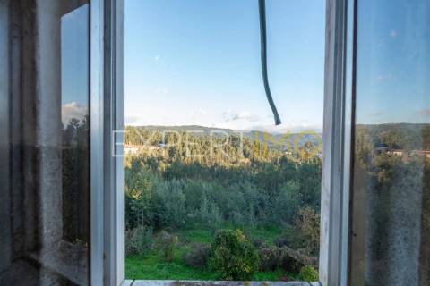 Moradia isolada com terreno e poço em Anaguéis (Almalaguês, Coimbra)