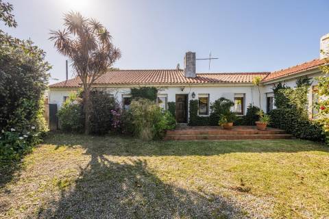 Moradia térrea nas "Quintas do Norte" com jardim e garagem - entre a praia e a ria