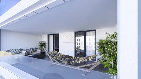 Espaço e Conforto no Coração de Portimão - T2 com Varandas, e 2 estacionamentos