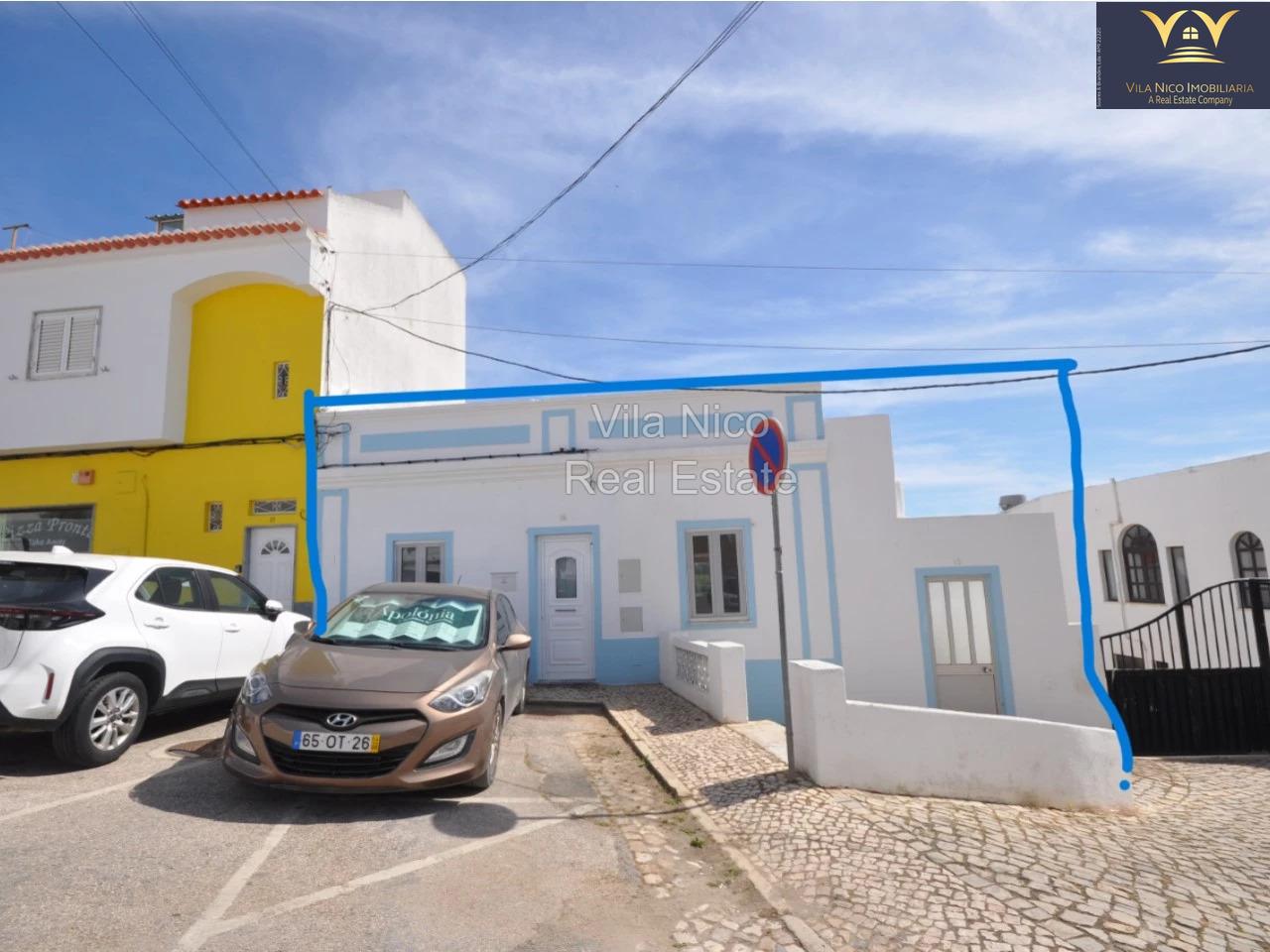 **Moradia Geminada em Estômbar com Vista para o Rio**