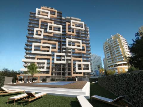 Apartamentos novos a 150 metros da Praia da Rocha com vista mar!