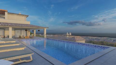 Terreno com Projeto aprovado para duas moradias com linda vista mar