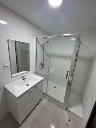 T2 no centro da cidade com lugar de garagem e terraço.