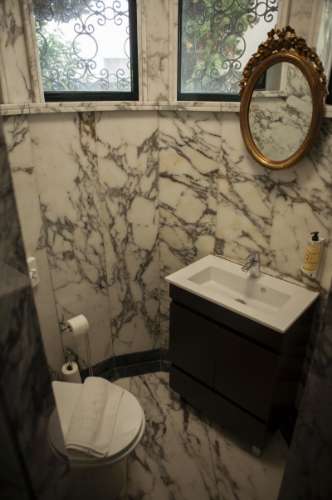 Moradia Isolada T11 com Licença AL, 9 suítes, multiusos e rentabilidade de 9,8%.