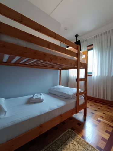 Moradia Isolada T11 com Licença AL, 9 suítes, multiusos e rentabilidade de 9,8%.