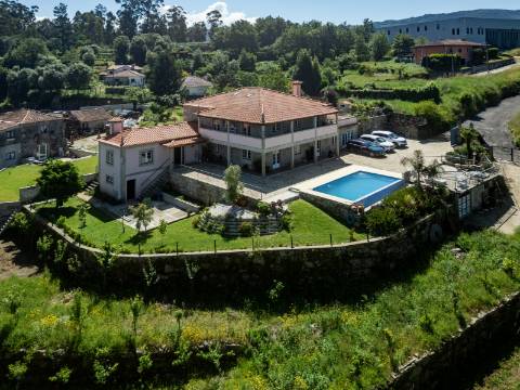 Deslumbrante Quinta de Pedra T4 com Piscina, Vista Rio e Potencial de Expansão - Ponte de Lima