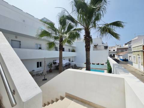 Olhão - Apartamento duplex T3 com rooftop, piscina e garagem