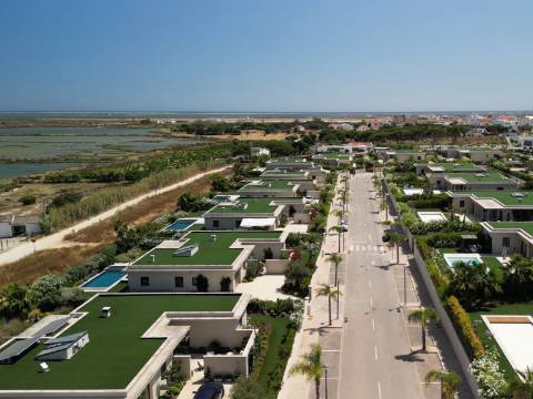 Faro - Moradia T3 em condomínio de luxo com vista para a Ria Formosa