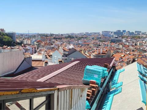 Apartamento com vista num condomínio com Jardim e piscina Arroios