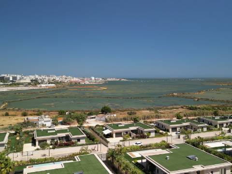Faro - Moradia T4 em condomínio de luxo com vista para a Ria Formosa