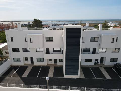 Apartamento T3 novo com estacionamento em Fuzeta