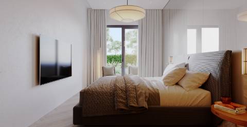 Apartamento T2 moderno com jardim privativo, sol e piscina.