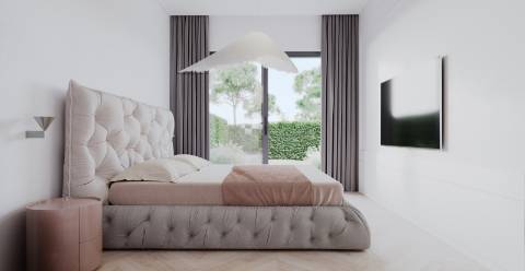 Apartamento T2 moderno com jardim privativo, sol e piscina.