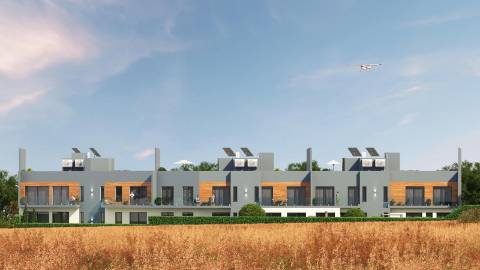 Apartamento T2 moderno com jardim privativo, sol e piscina.